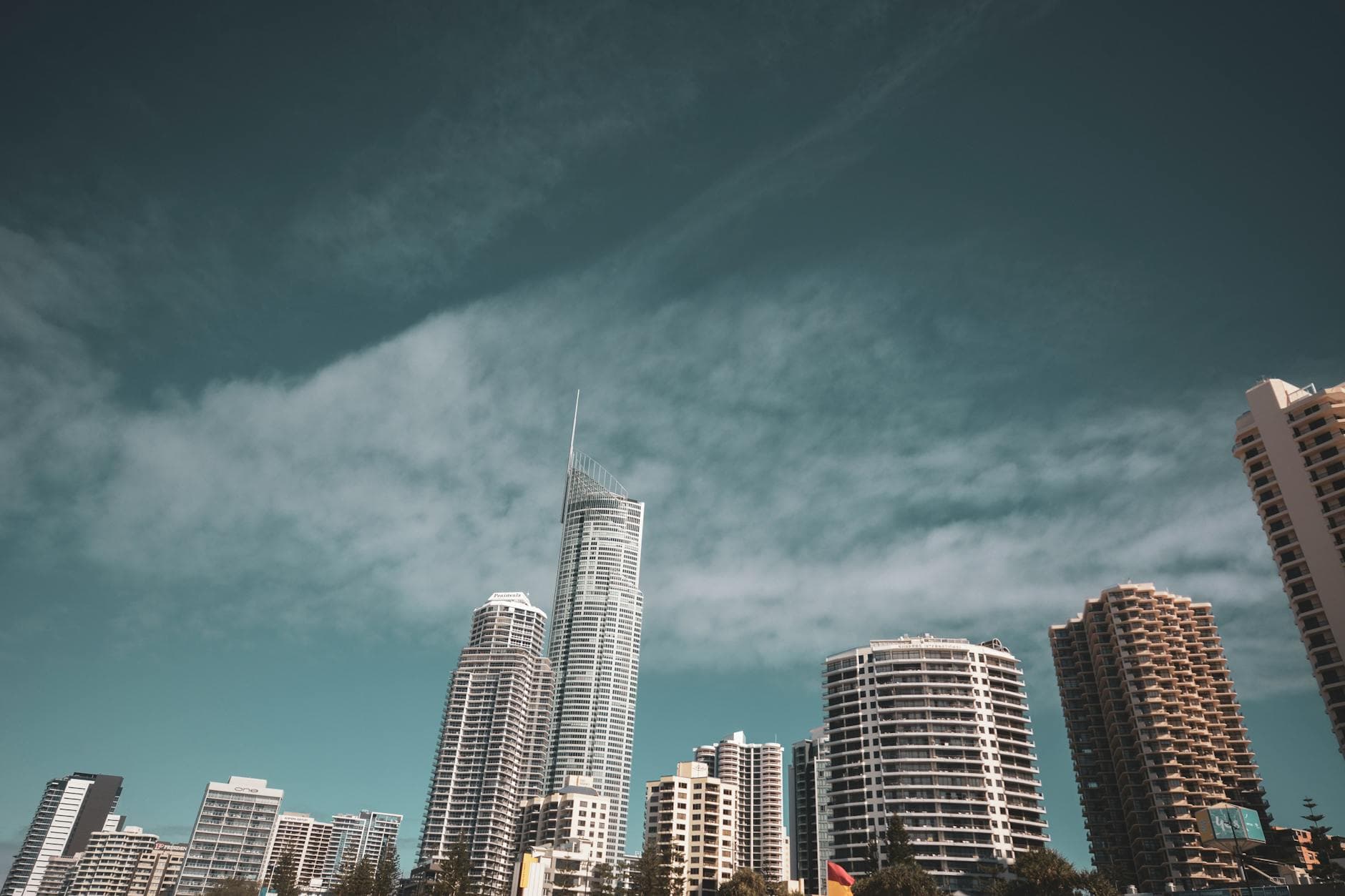 A stunning view of Surfers Paradise skyline with modern skyscrapers under a clear blue sky.