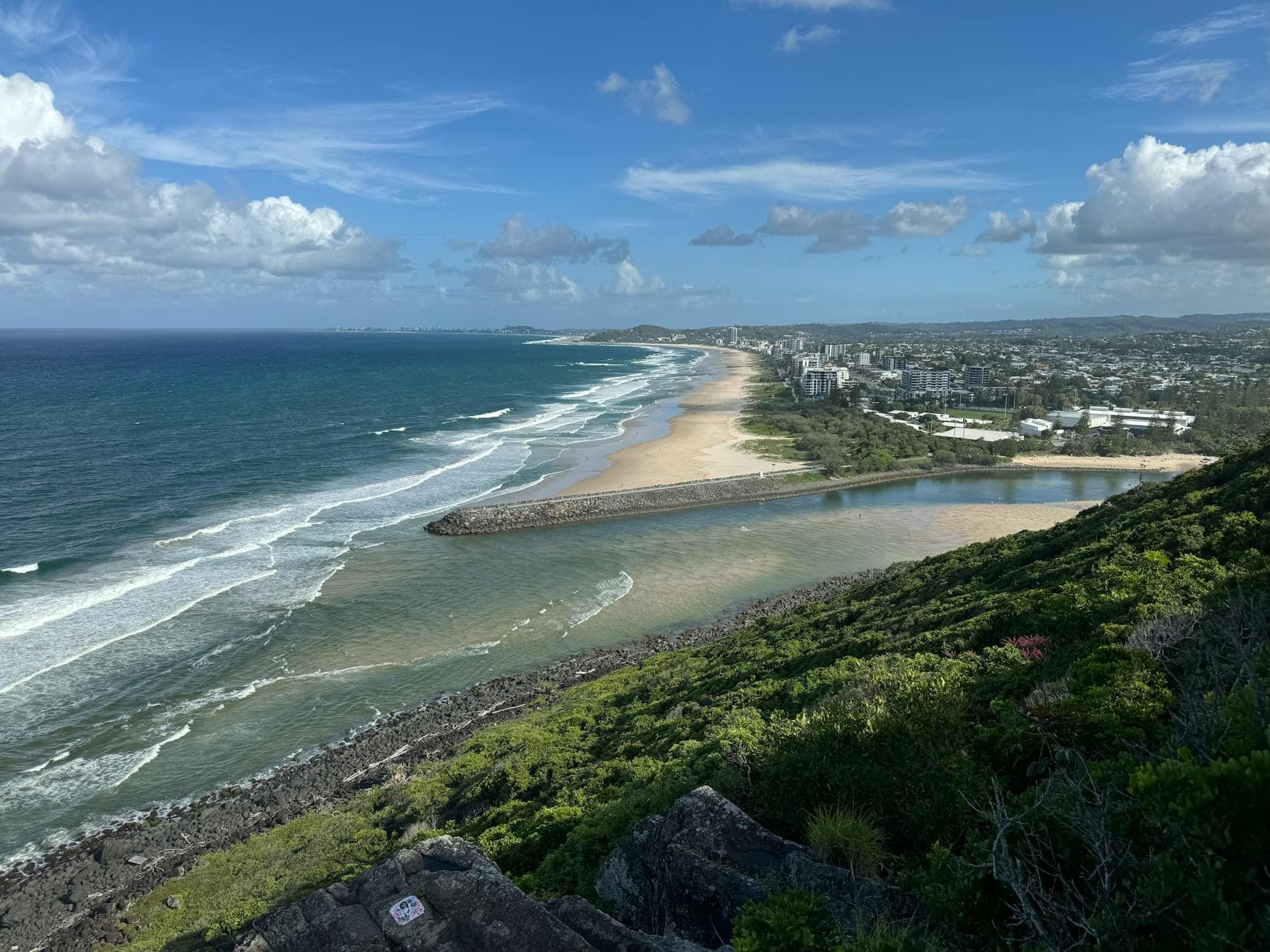 Beautiful aerial view of Burleigh Head National Park overlooking the ocean and beach in Queensland, Australia.