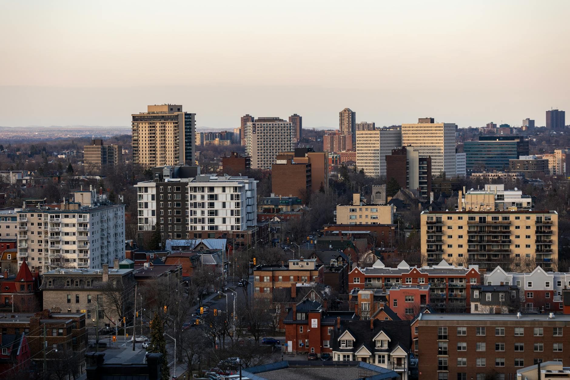 Aerial view of downtown Ottawa, Canada, showcasing diverse architecture at dusk.