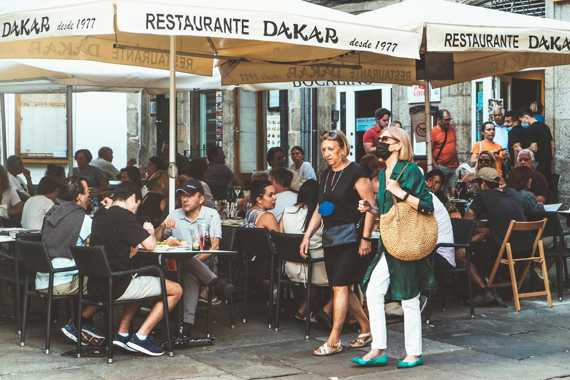 Vibrant outdoor dining at Restaurante Dakar in Santiago de Compostela, Spain.