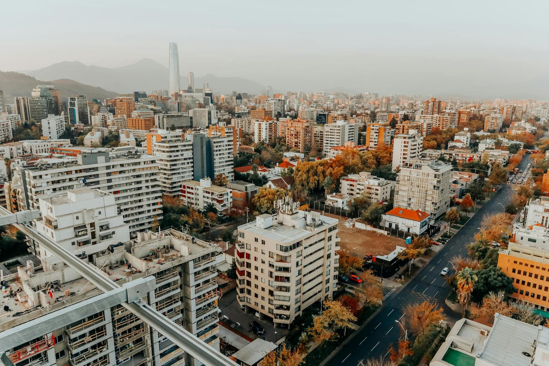 Aerial view of the vibrant Santiago cityscape during the day, showcasing modern architecture.