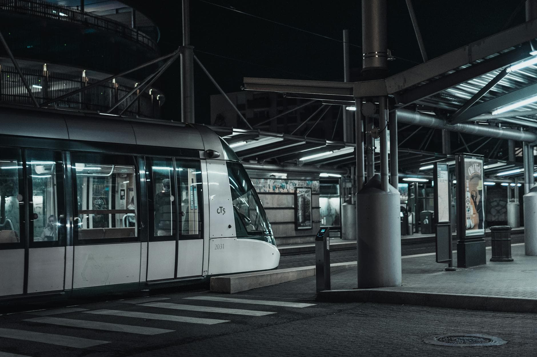 A modern tram station in Strasbourg, France, captured at night. Urban transportation and architecture.