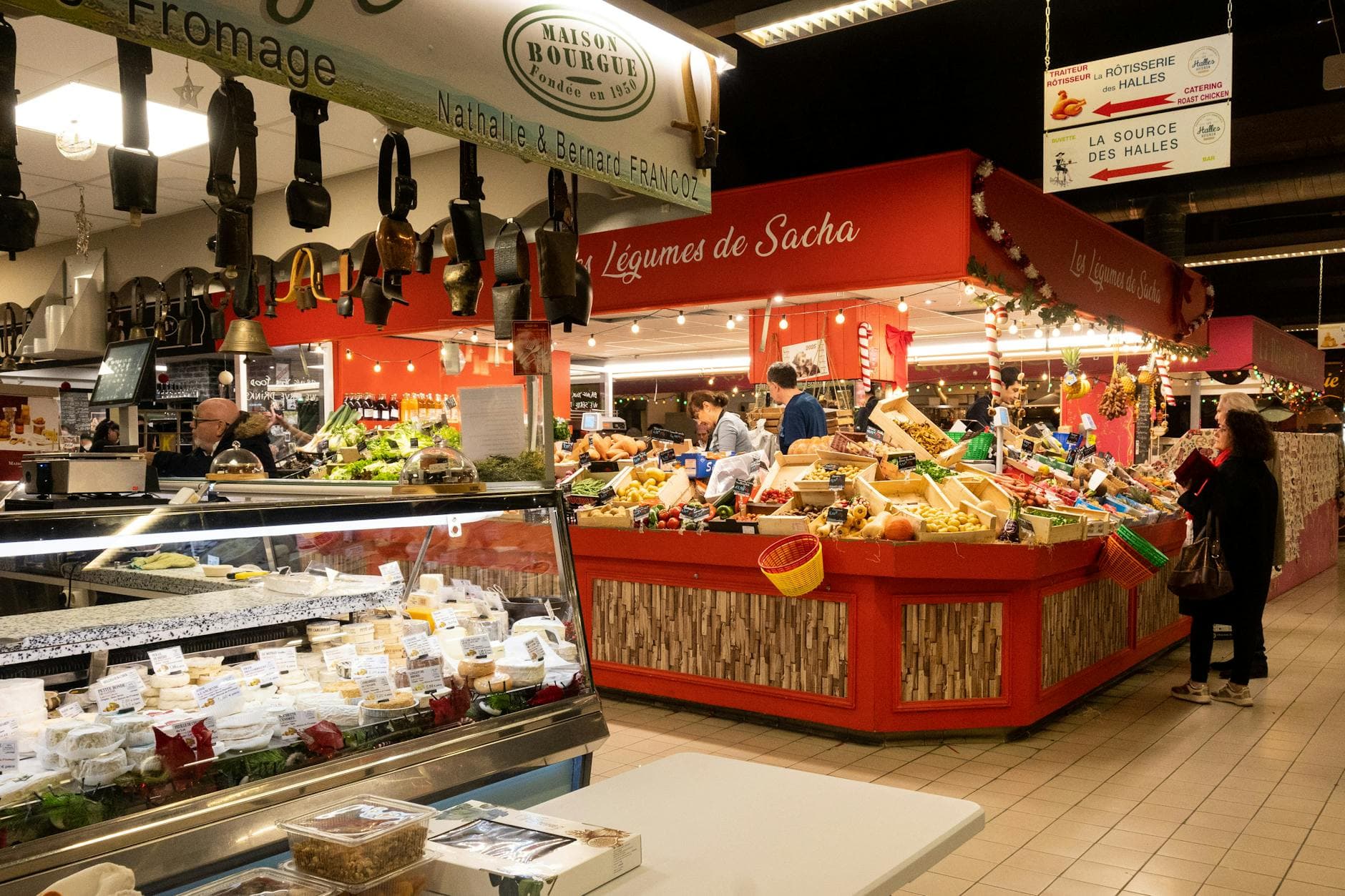 Bustling indoor market scene in Avignon, capturing diverse stalls and vibrant produce.