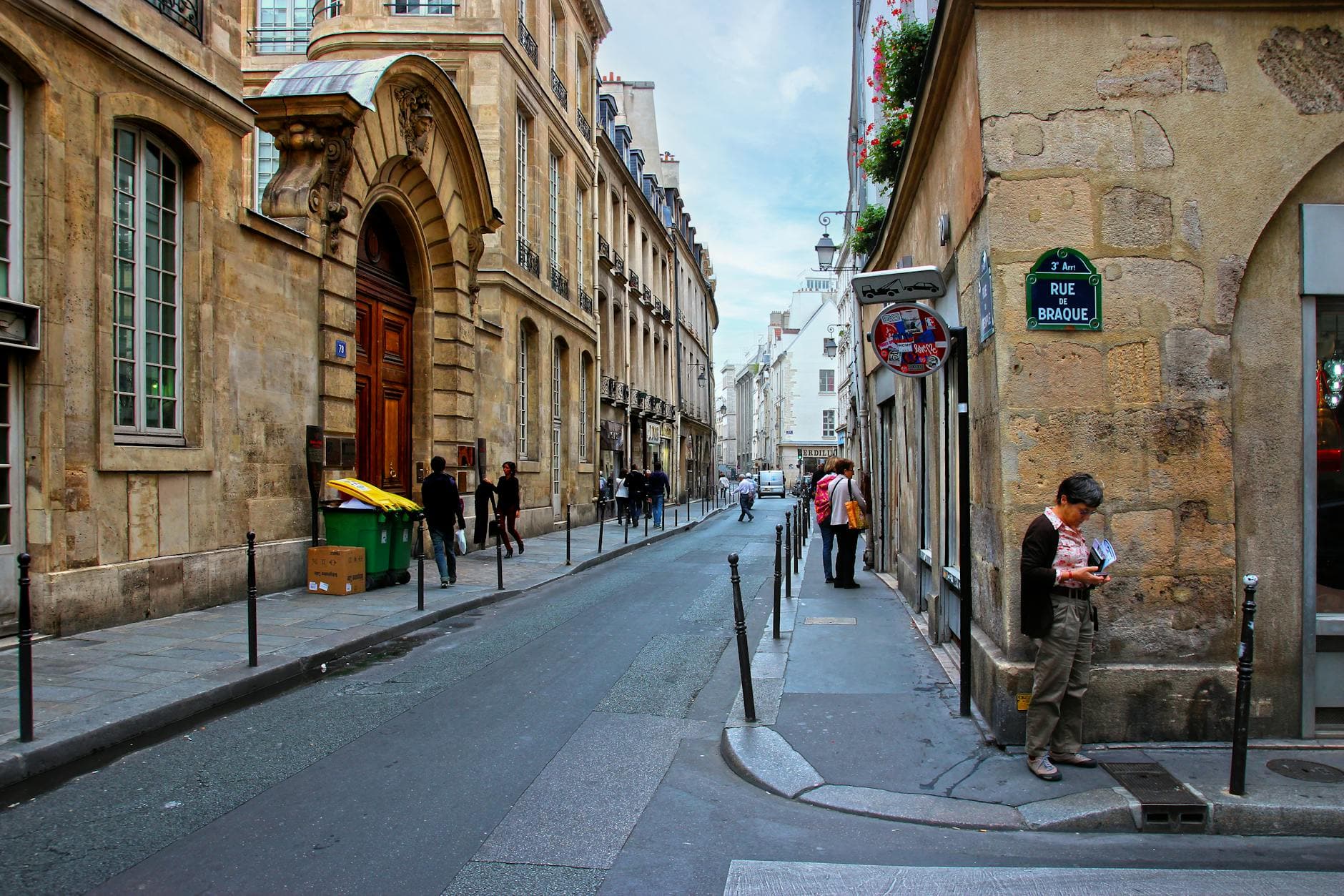 Rue Braque in Le Marais, Paris captivates with classic architecture and vibrant street life.