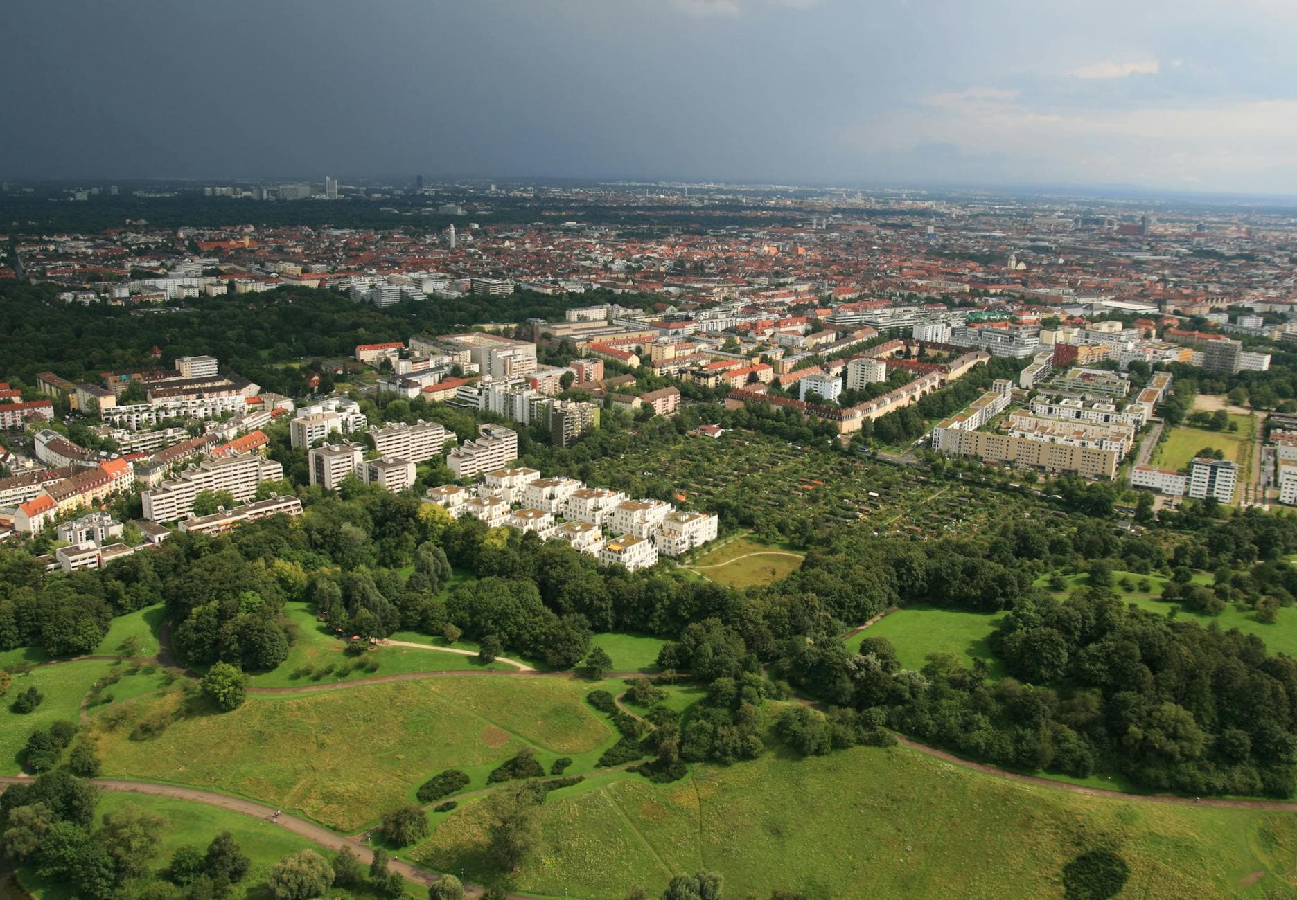 Stunning aerial view of Munich showing the city's urban landscape and green parks.