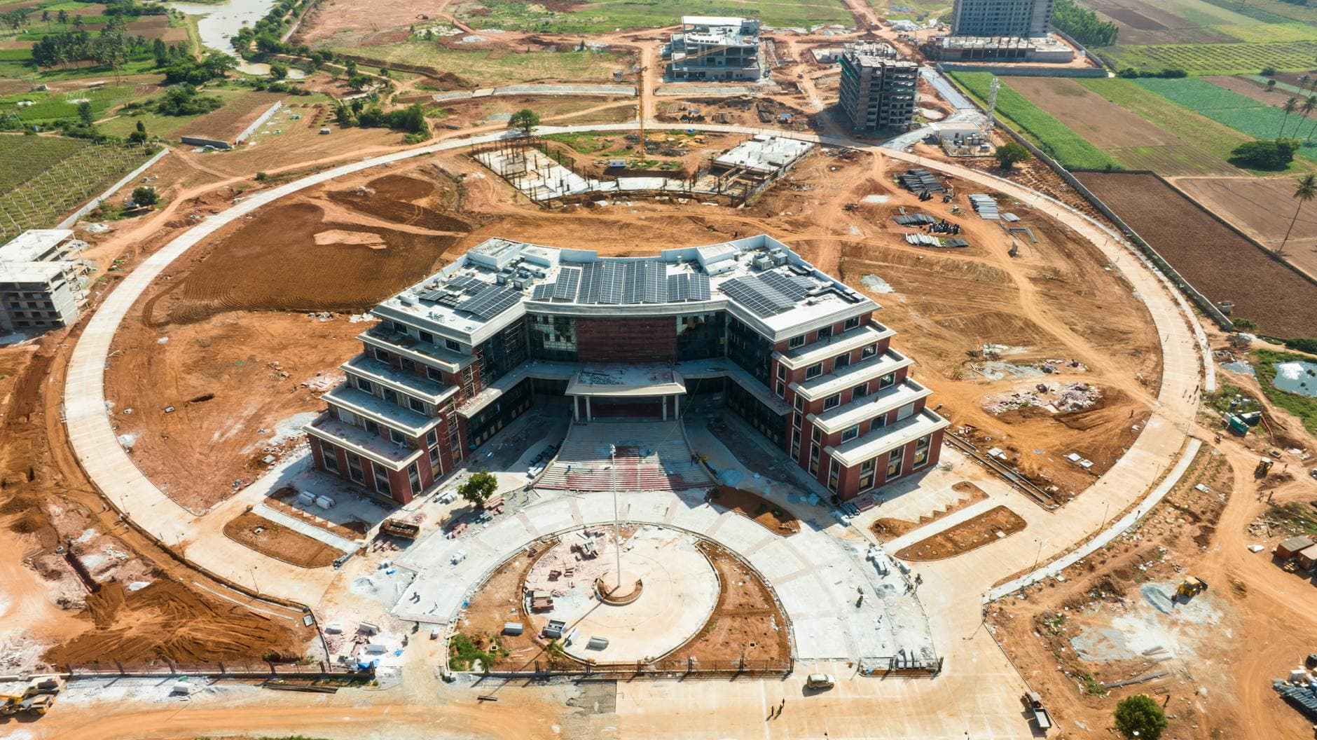 Aerial shot of modern construction in Bangalore, showcasing architectural innovation.