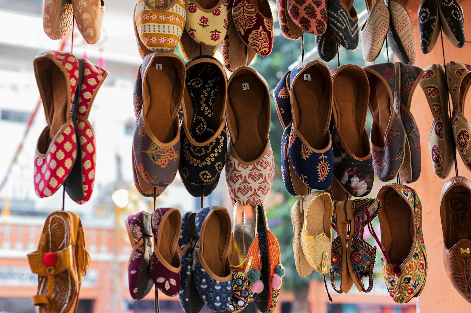 Vibrant traditional Indian juttis on display, showcasing cultural heritage in Jaipur.