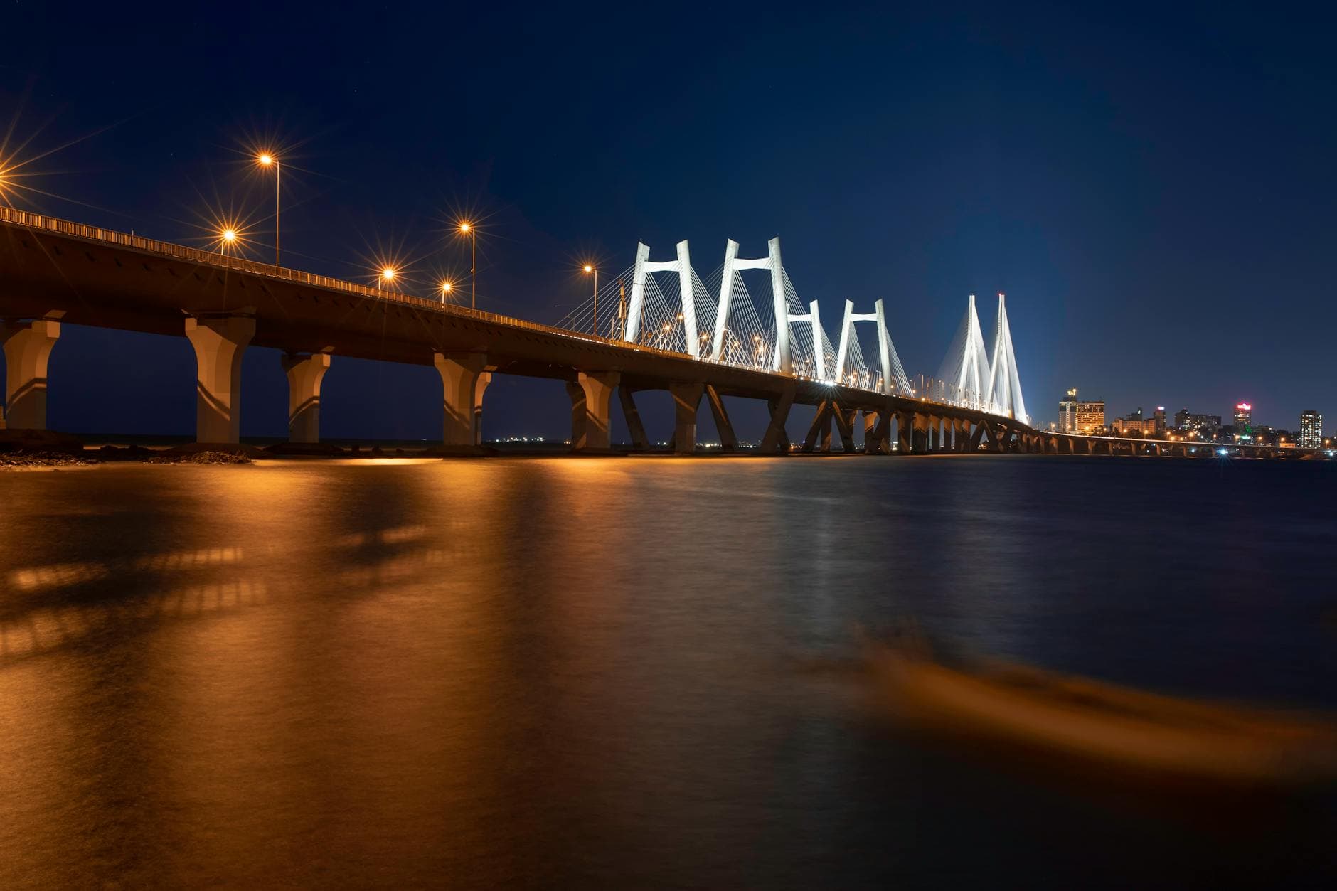 Stunning view of the illuminated Bandra-Worli Sea Link in Mumbai at night.