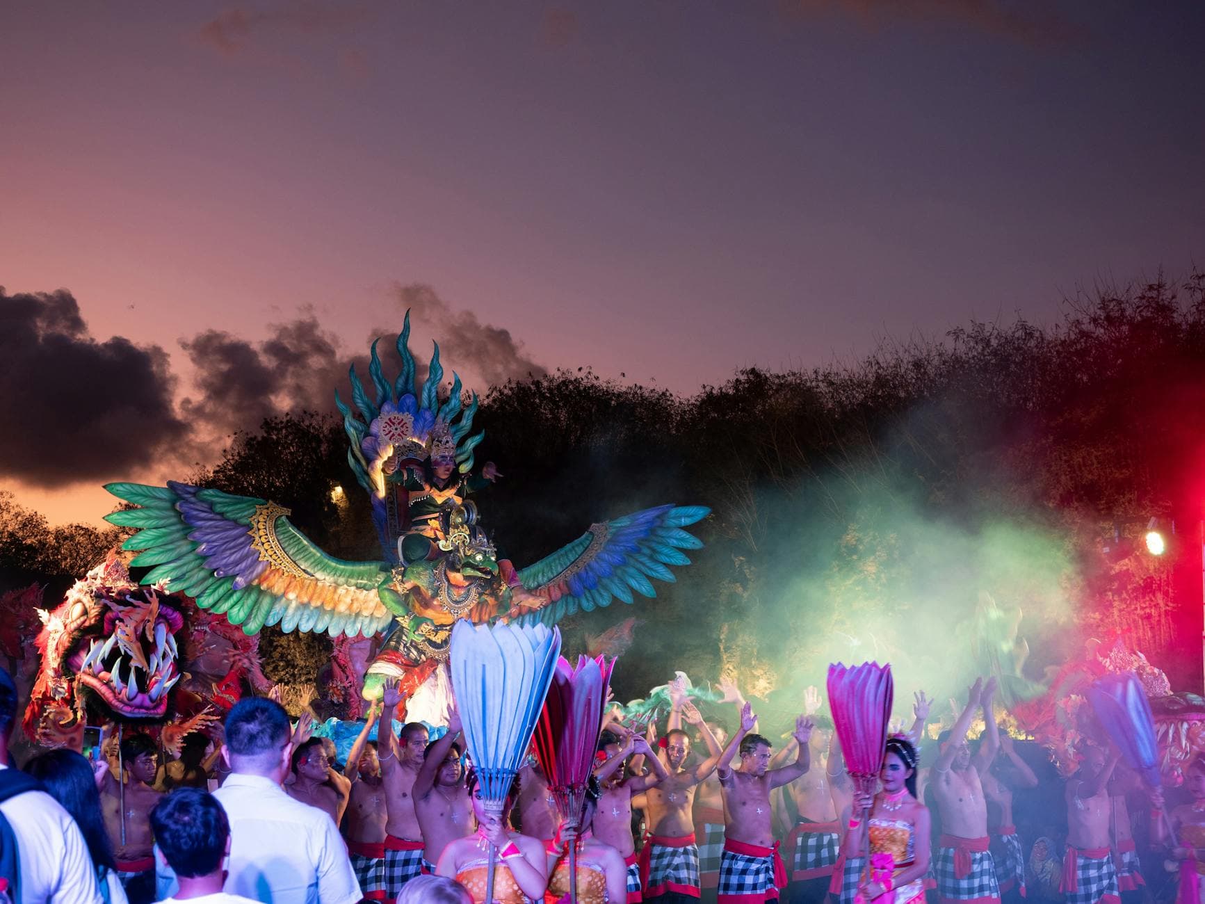 Lively dance performance with traditional costumes and masks in Bali, Indonesia.