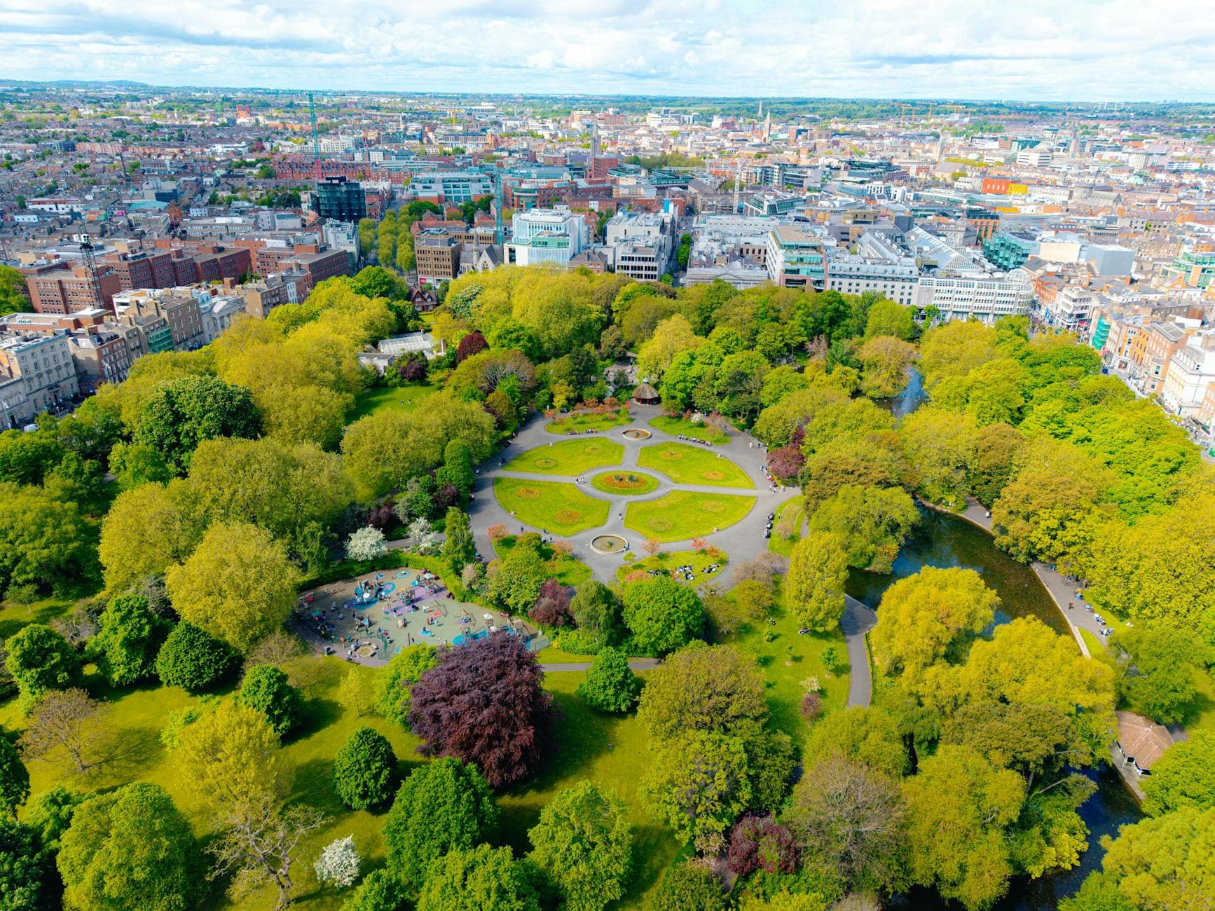 Stunning aerial view of St. Stephen's Green park amidst Dublin cityscape.