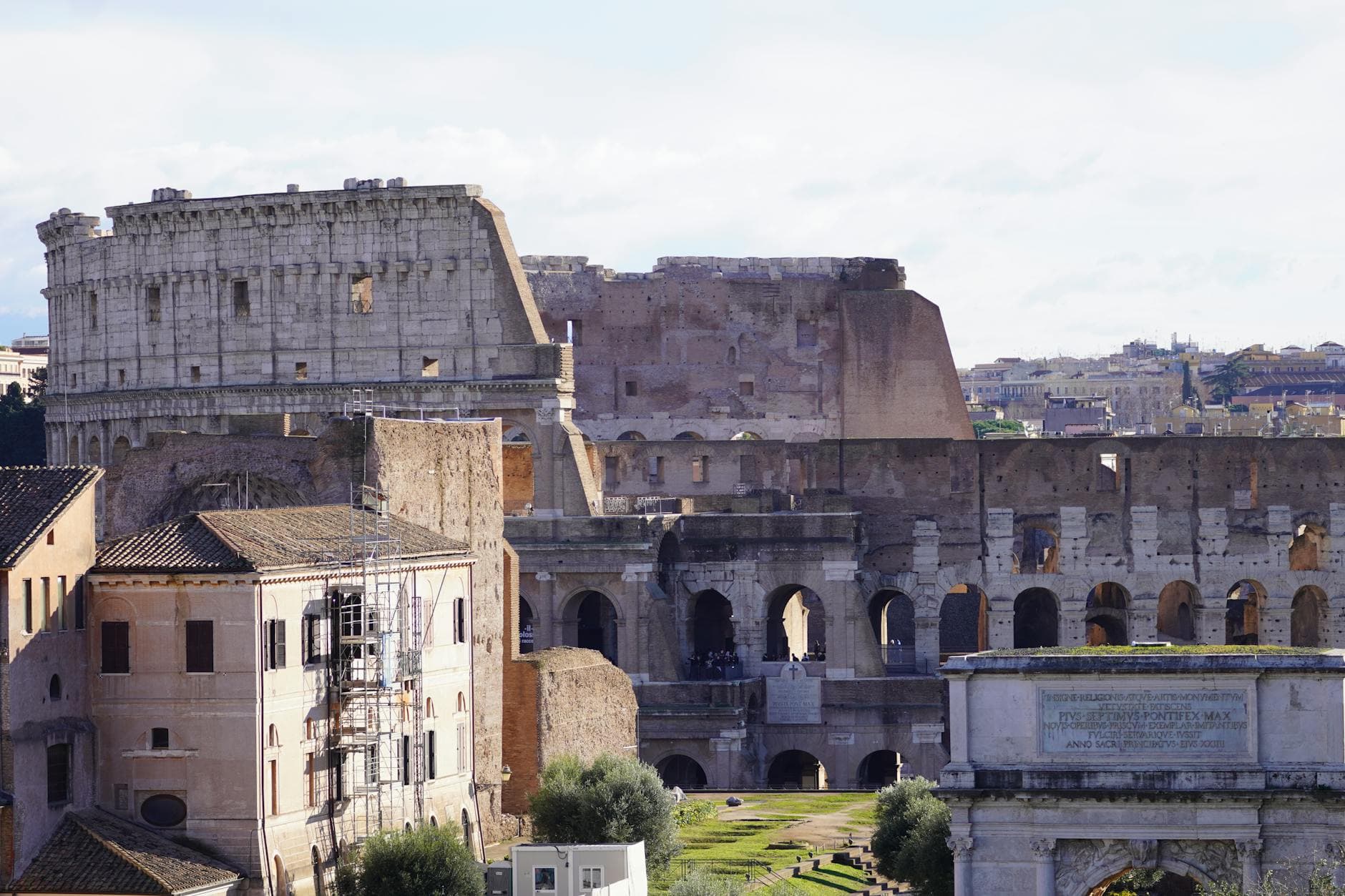 View of the iconic ancient Colosseum in Rome, showcasing its historic architecture.