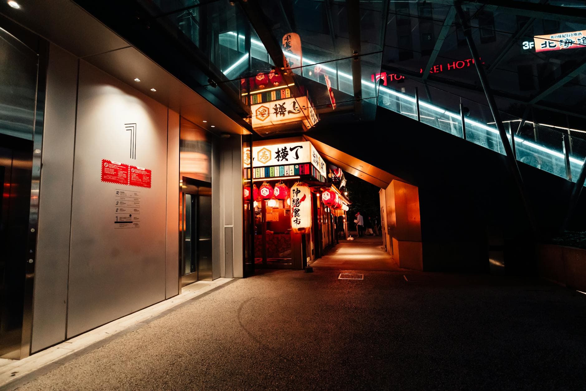 Explore the vibrant nightlife of a Japanese city in this atmospheric alleyway scene.