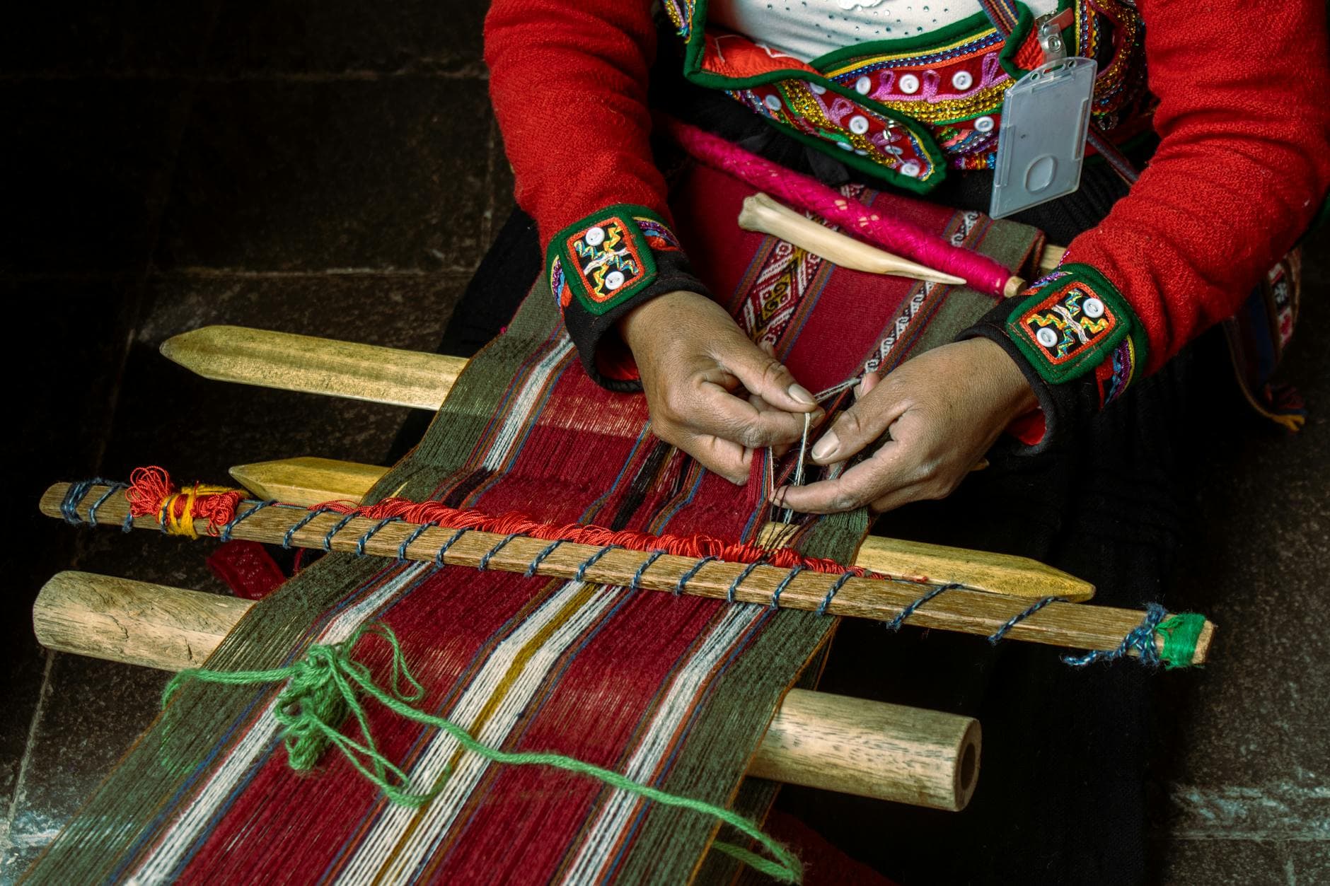 A close-up of traditional textile weaving in Cusco, showcasing cultural craftsmanship.