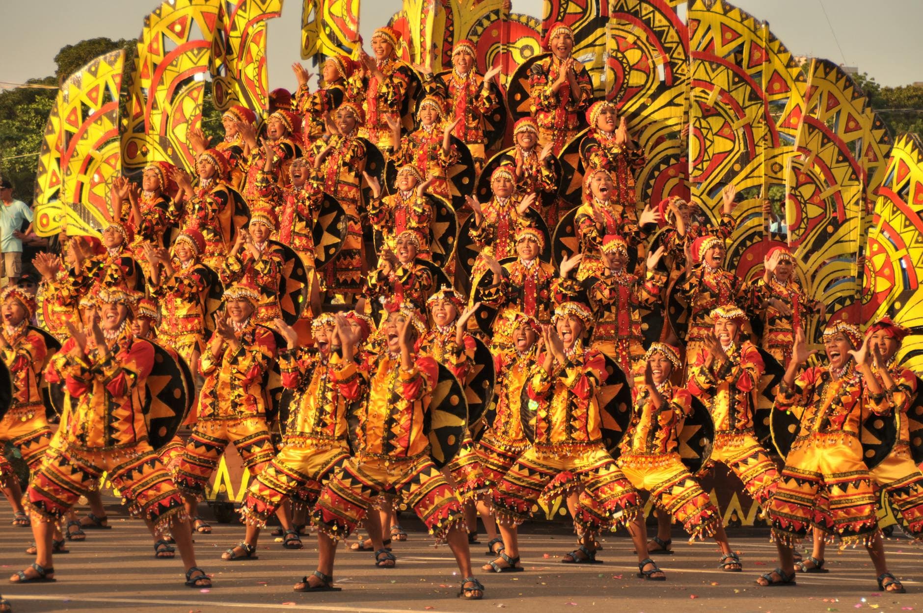 Colorful celebration of traditional Filipino dance at an outdoor festival, showcasing rich cultural heritage.