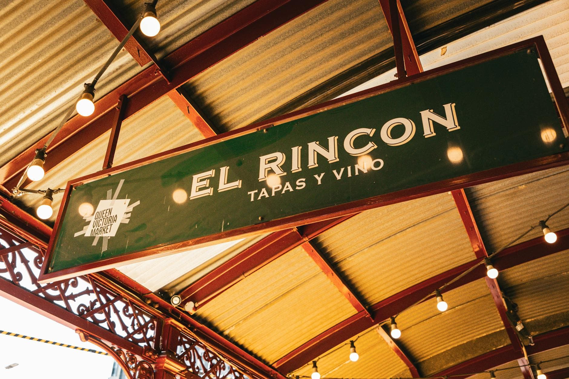 El Rincon sign at Queen Victoria Market captures the lively atmosphere of Melbourne's iconic spot.