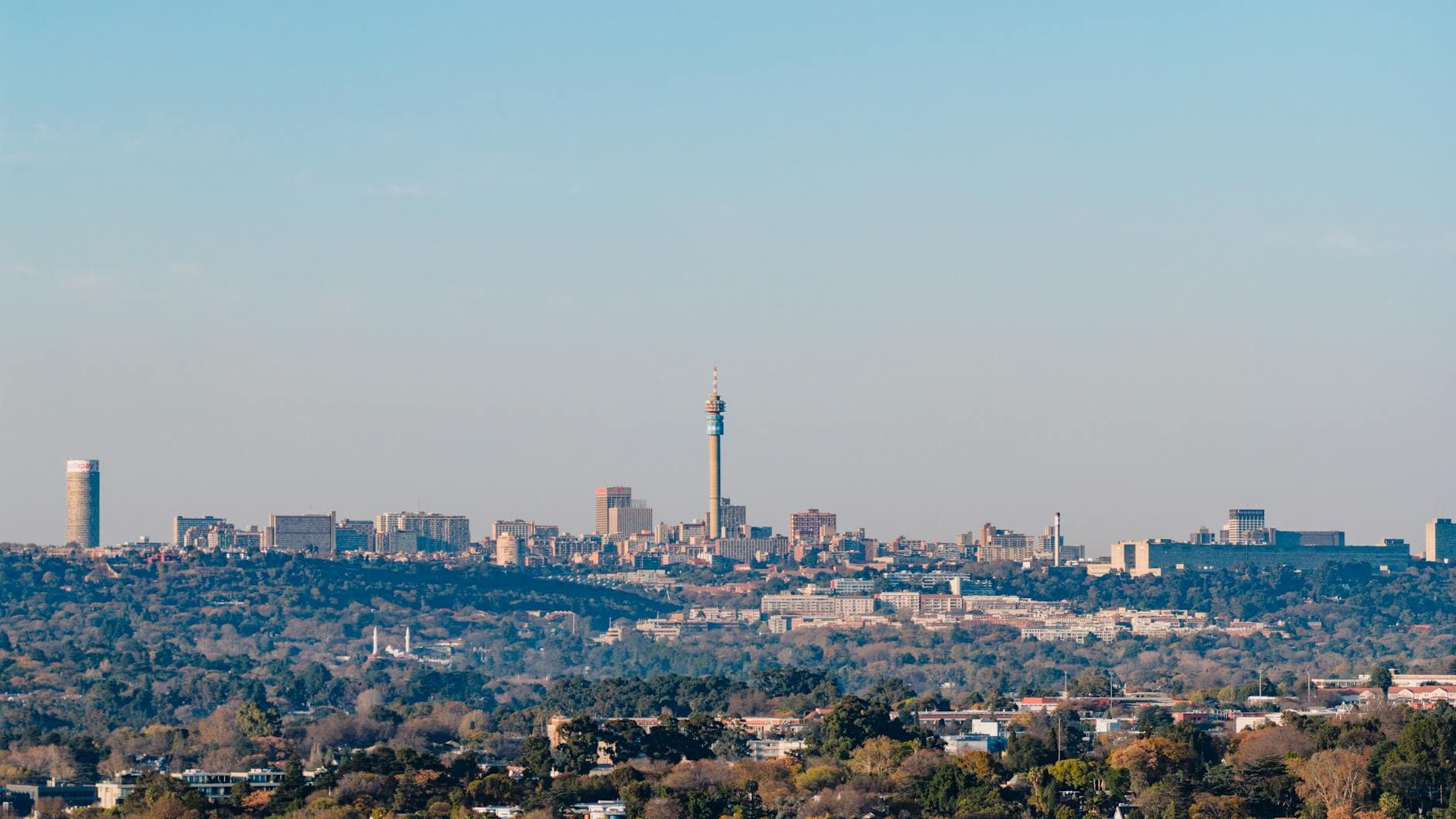 Shot of Johannesburg skyline featuring the iconic Hillbrow Tower on a clear day.