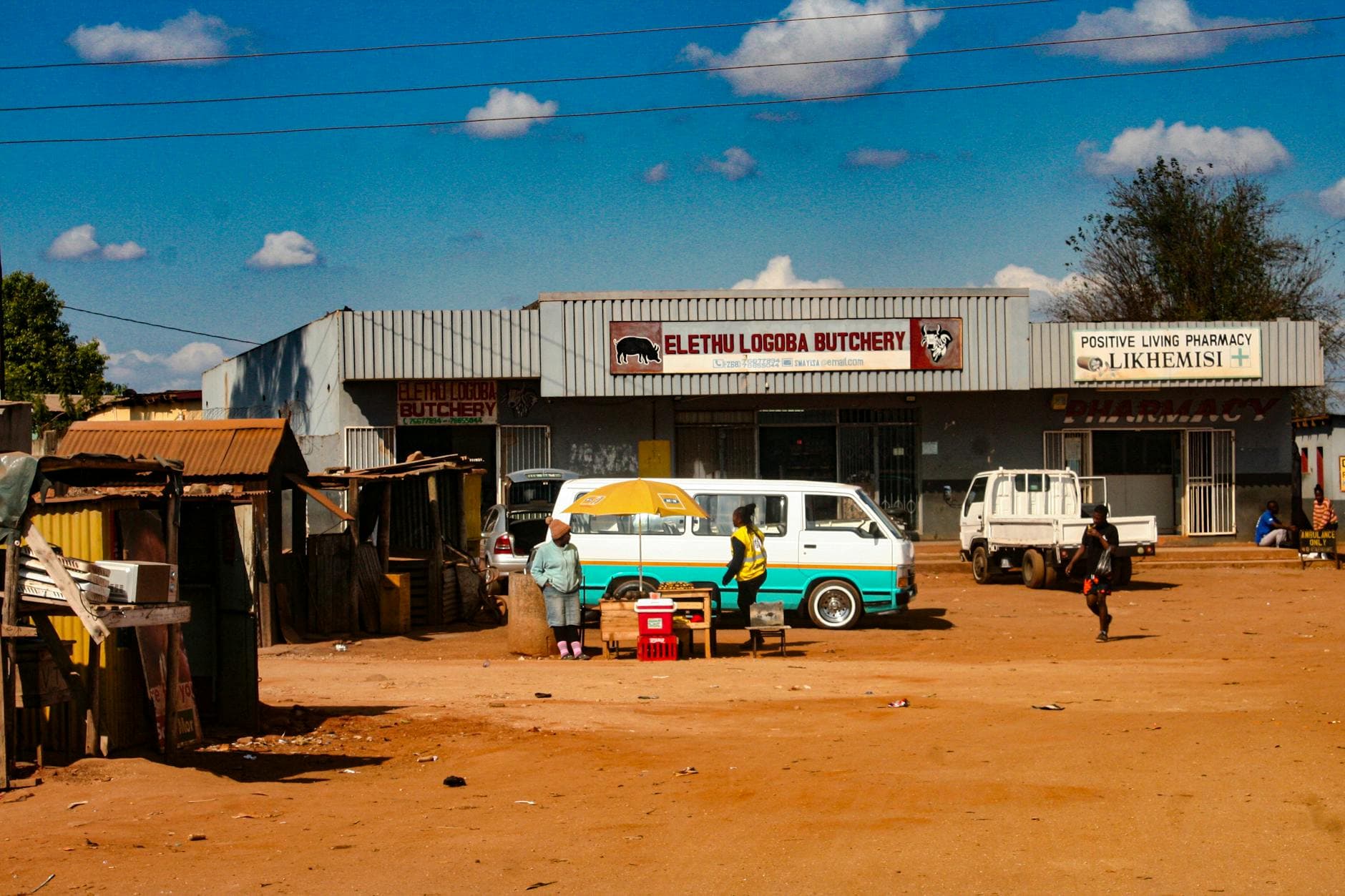 Vibrant street life in Mbabane, Eswatini with a bustling market scene.