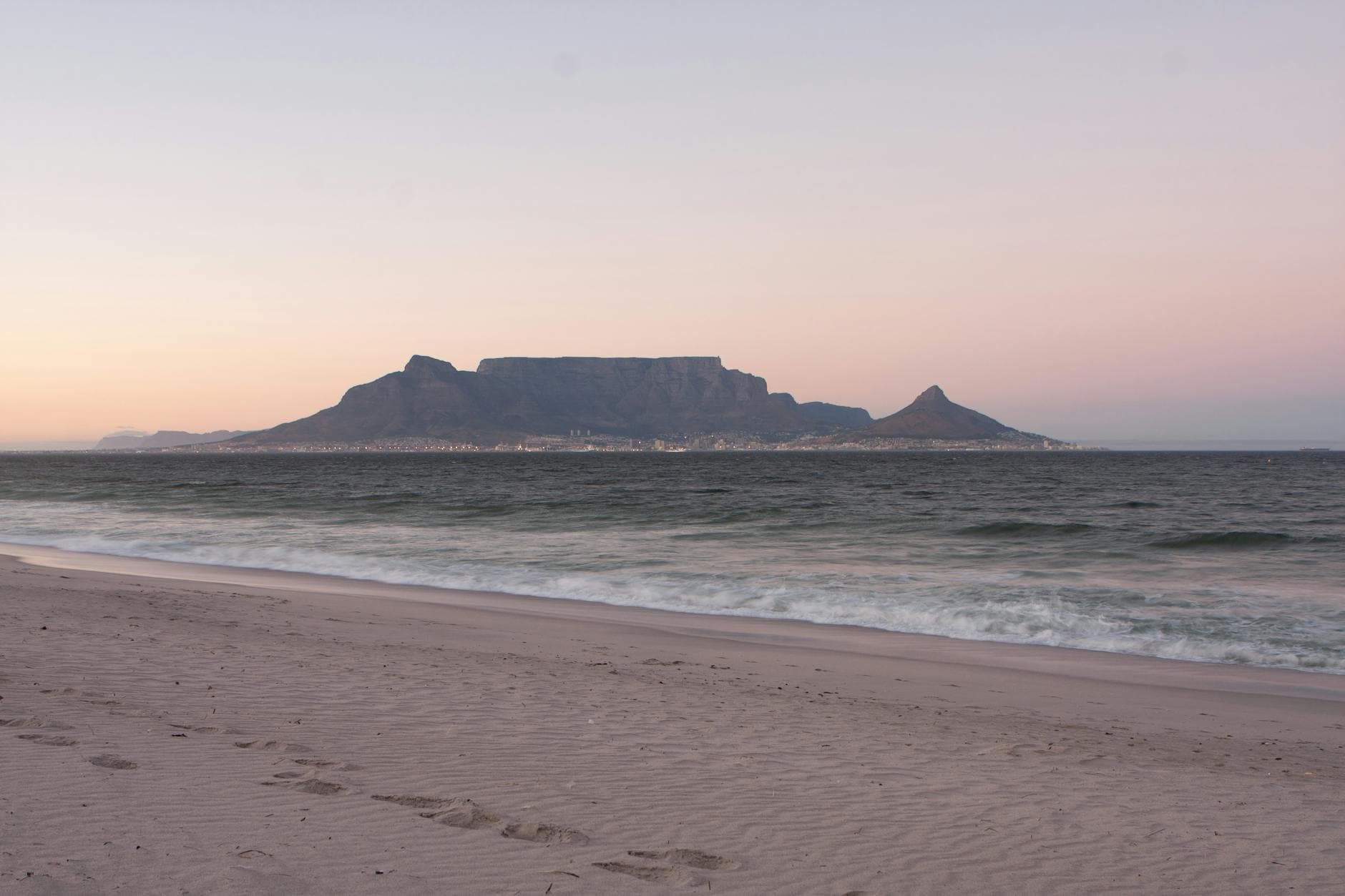 Scenic view of Table Mountain at sunset from Bloubergstrand Beach, Cape Town.