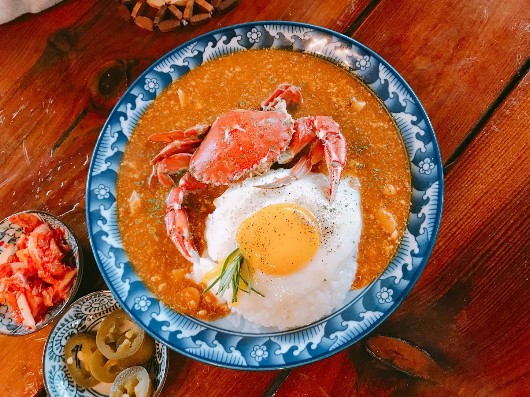 Delicious crab curry served with rice and a fried egg, shot in Jeju, South Korea.