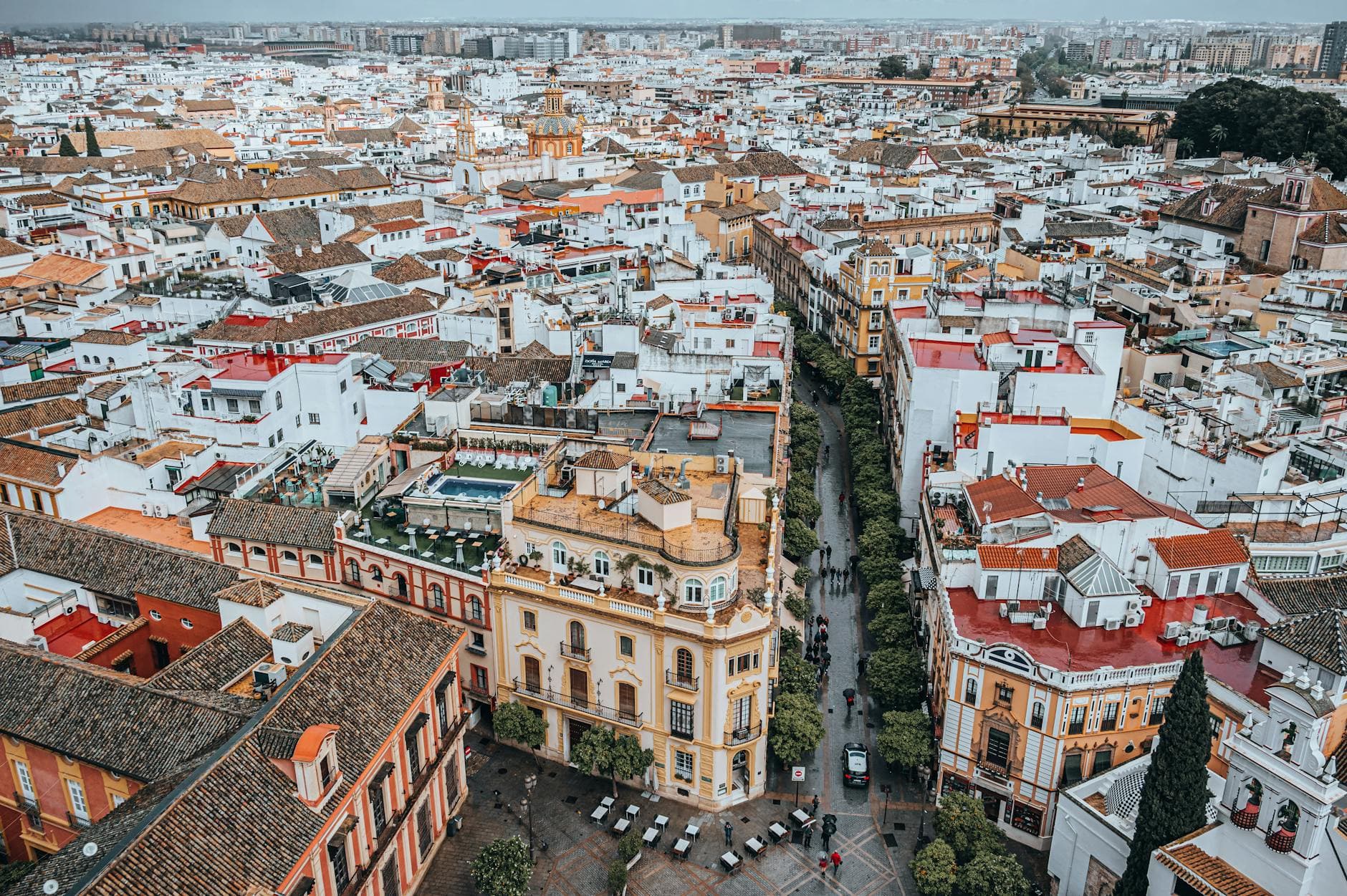 Captivating aerial view of Seville, Spain showcasing its dense, historic urban architecture.