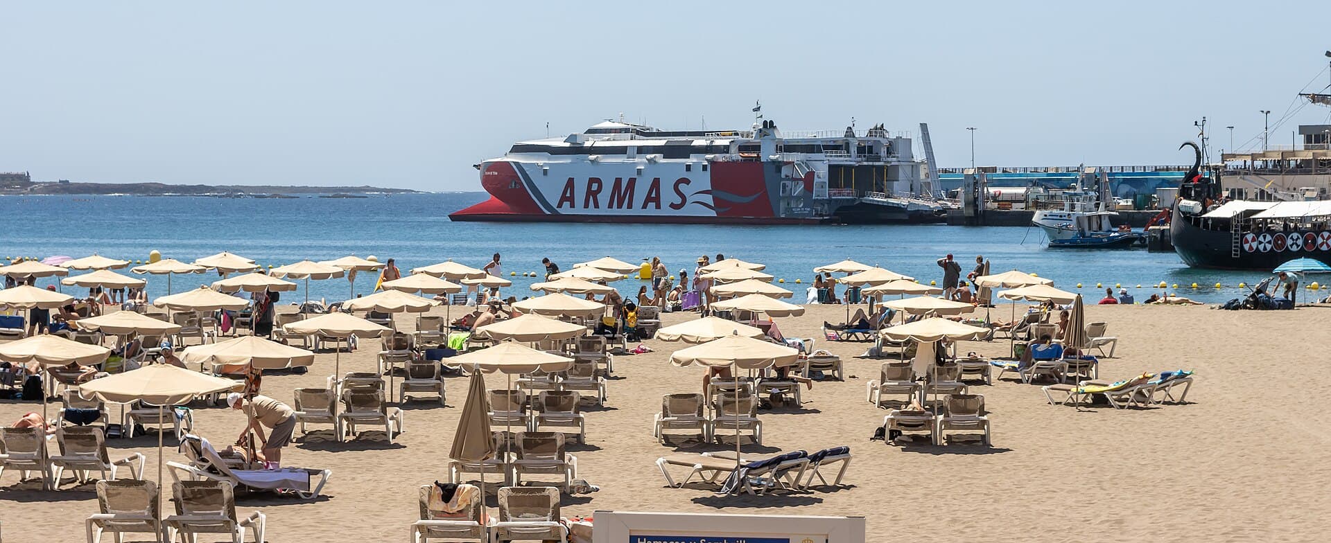 At Tenerife 2023 487 - Volcan de Teno and Ragnarok at the Port of Los Cristianos behind Playa Honda