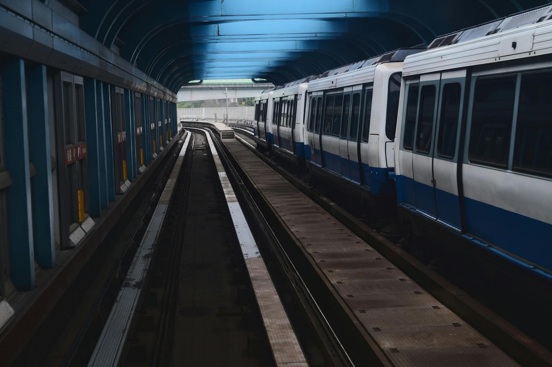 A view of Taipei's MRT metro train navigating through a modern tunnel, offering a unique transportation perspective.