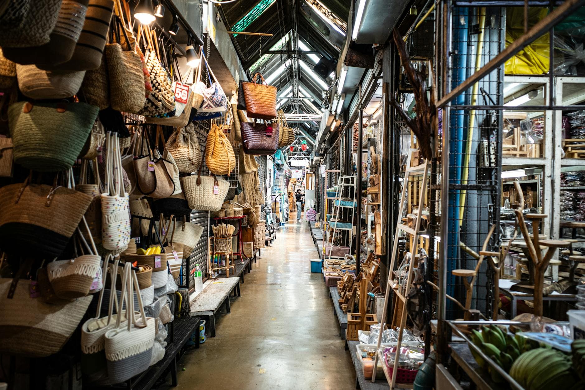 Explore the vibrant and busy Chatuchak Weekend Market in Bangkok; perfect for shopping enthusiasts.