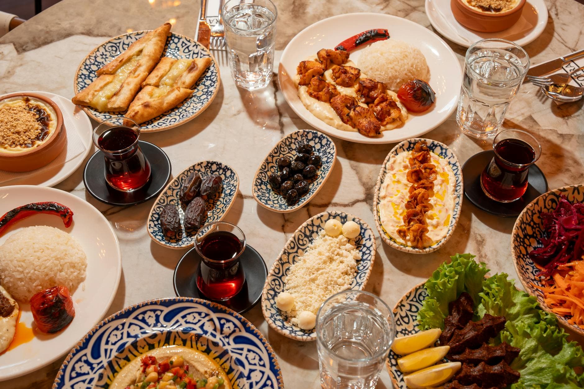 Colorful assortment of traditional Turkish dishes on a table in Ünye, Türkiye.