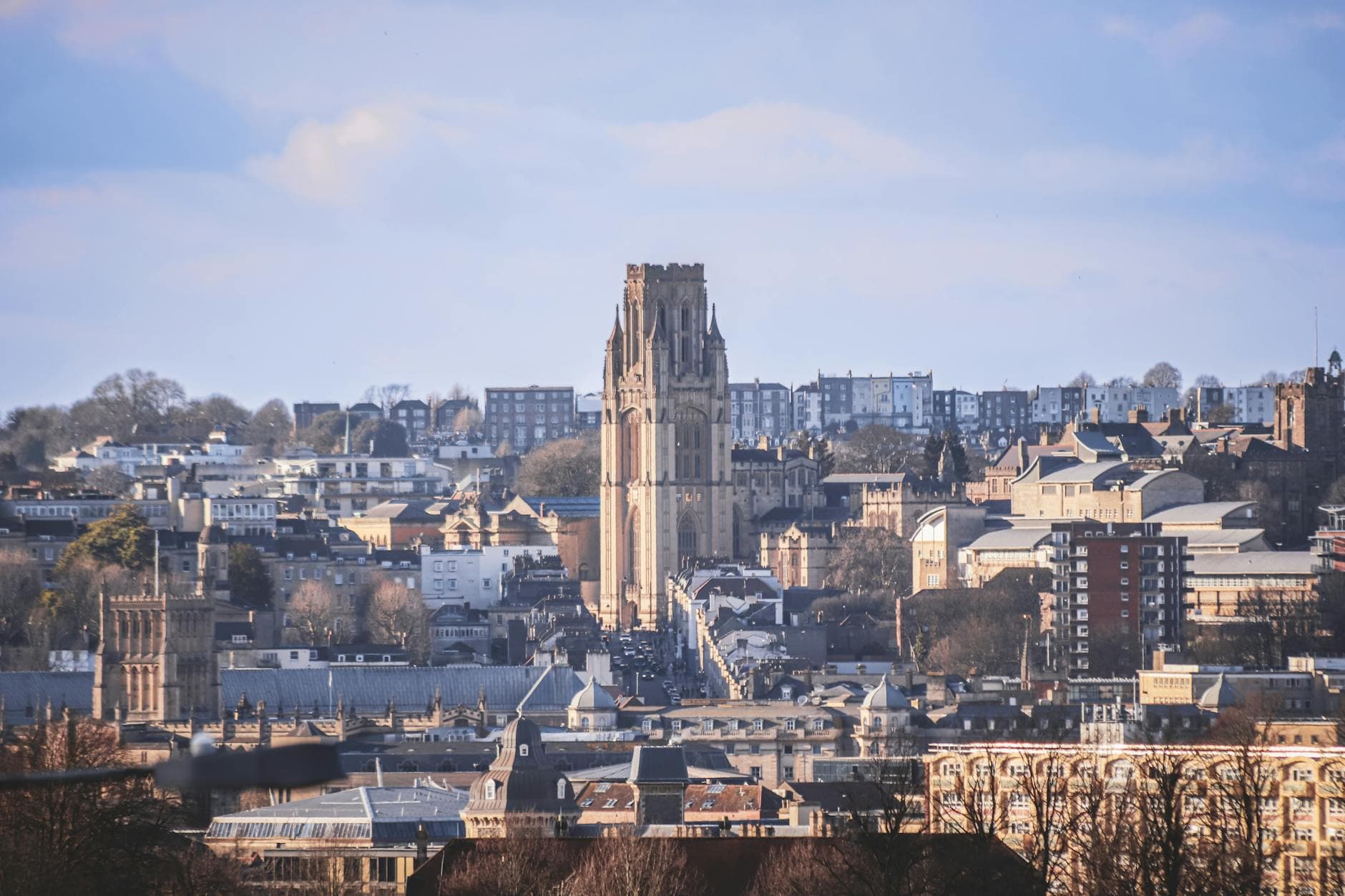 A stunning view of the Wills Memorial Building amidst the urban landscape of Bristol, England.