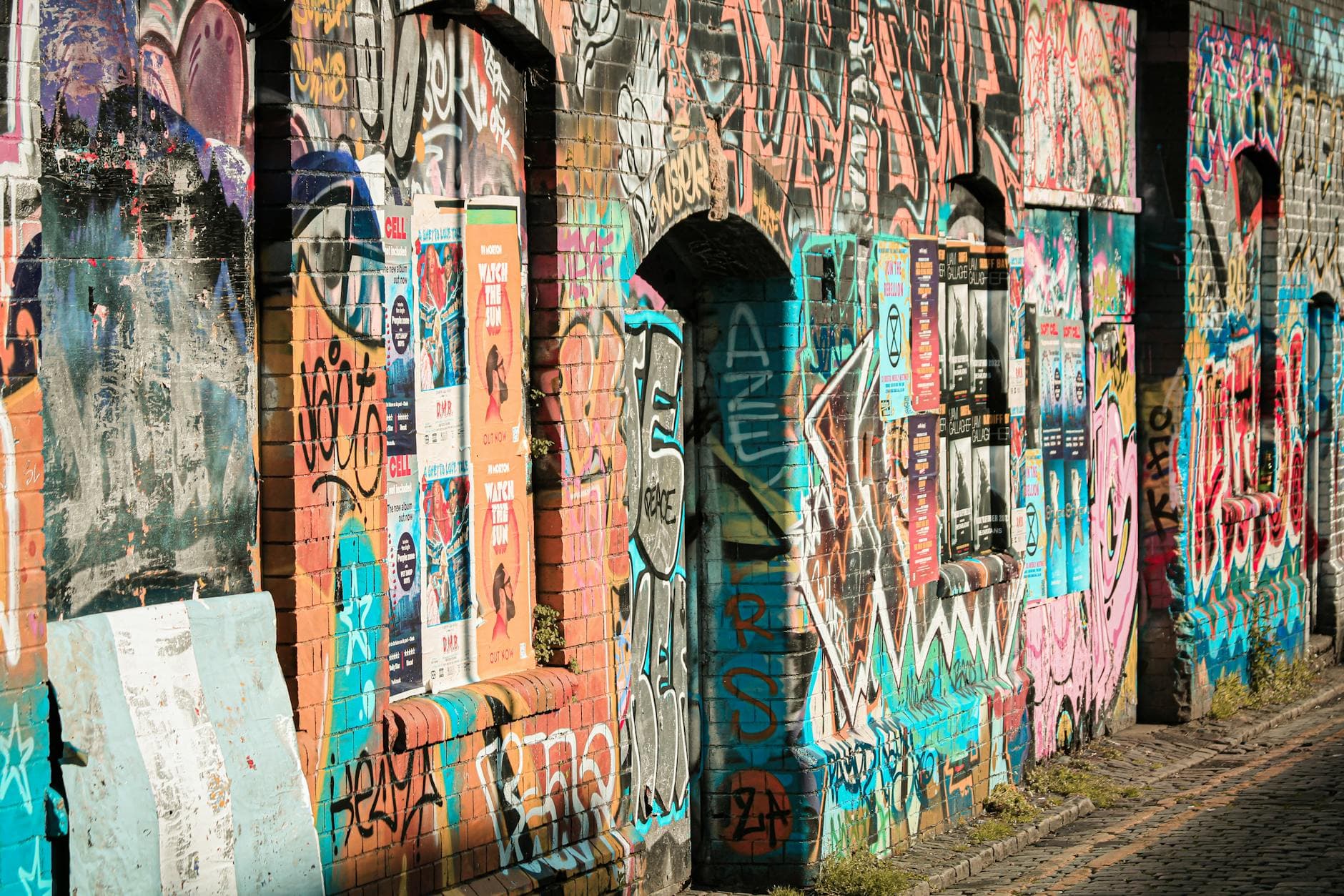 Colorful graffiti-covered walls in Bristol, showcasing urban street art.