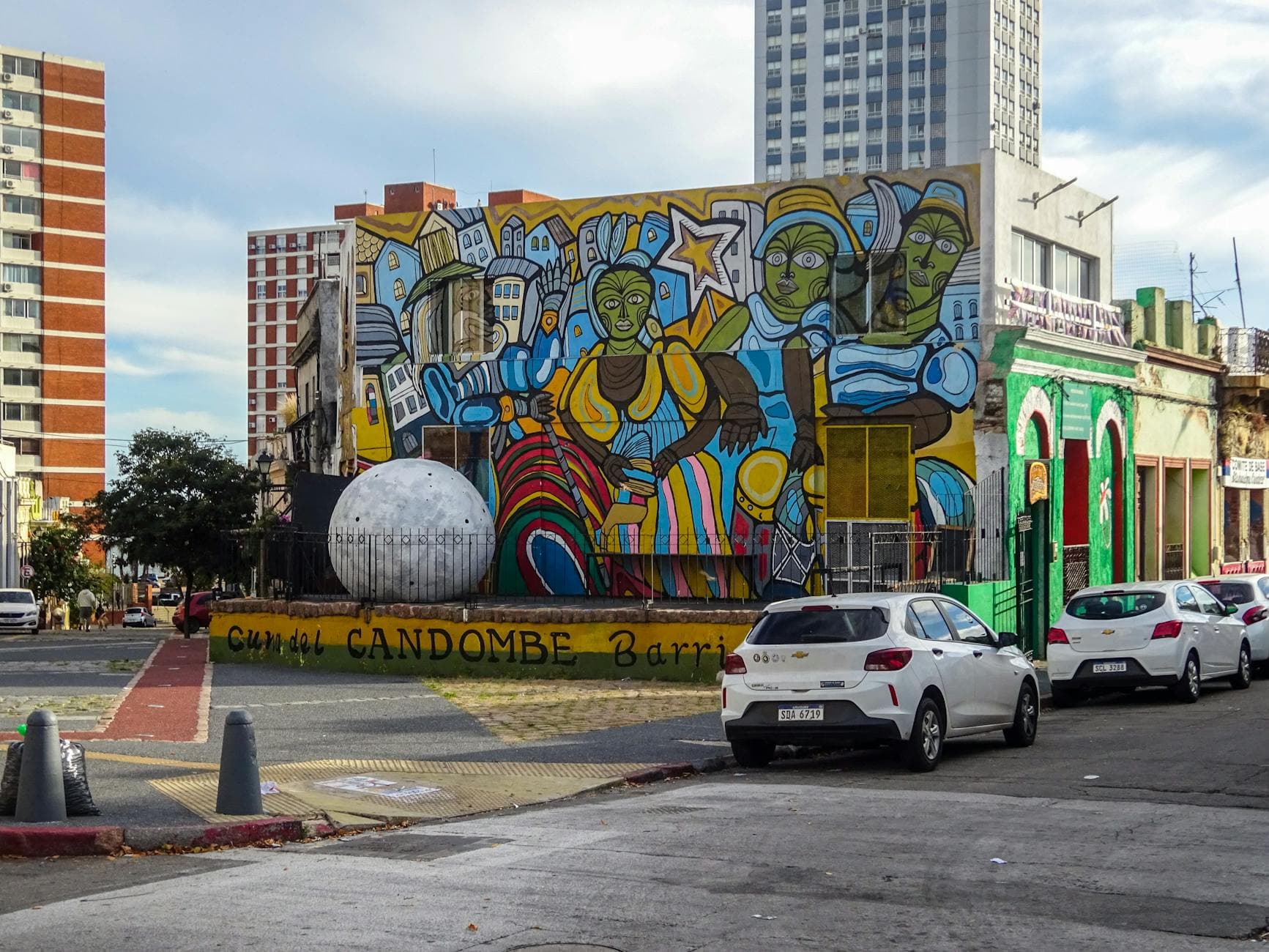 Vibrant mural depicting cultural themes in Montevideo, Uruguay.