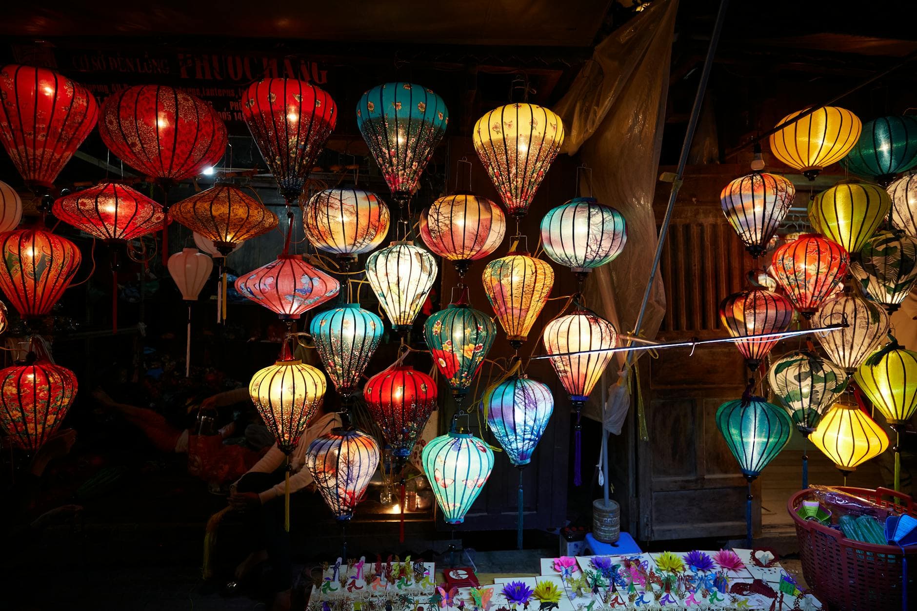 Colorful paper lanterns illuminate the Hội An Night Market with vibrant hues.